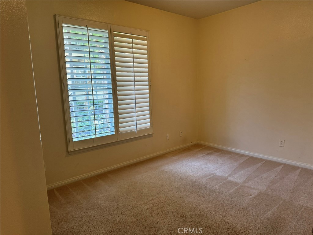 62 Shadowplay Irvine, CA 92620 - Photo 26 of 44 a view of an empty room with a window