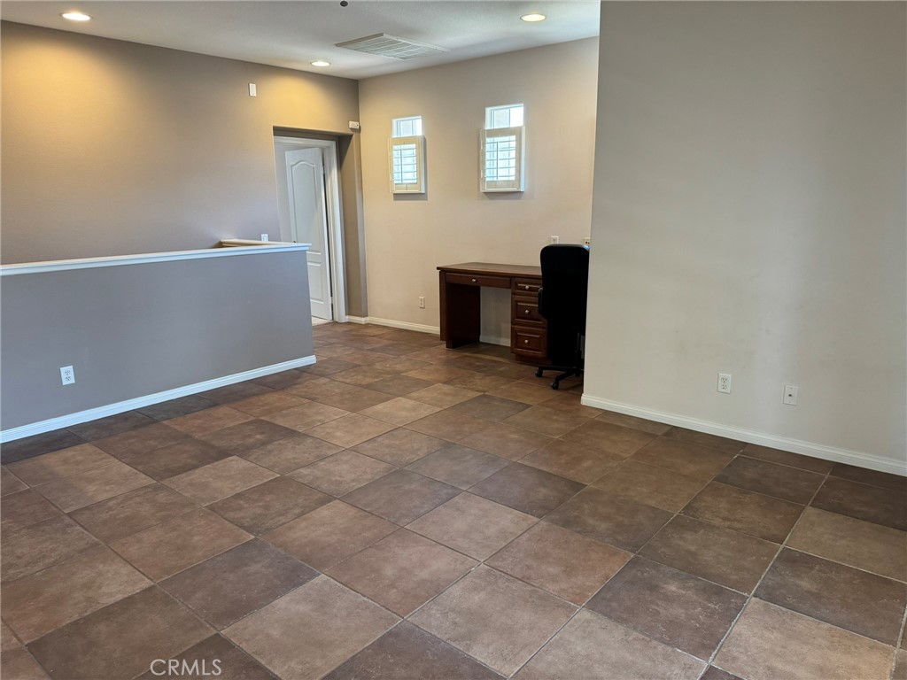 62 Shadowplay Irvine, CA 92620 - Photo 31 of 44 an empty room with windows