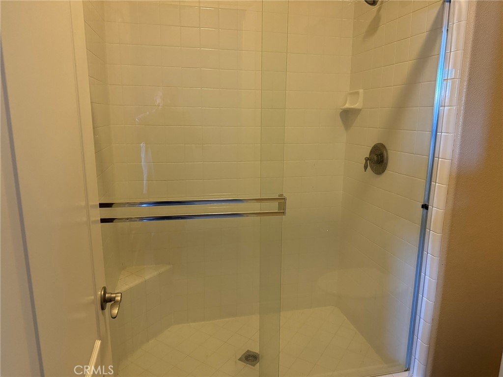 62 Shadowplay Irvine, CA 92620 - Photo 38 of 44 a bathroom with a shower