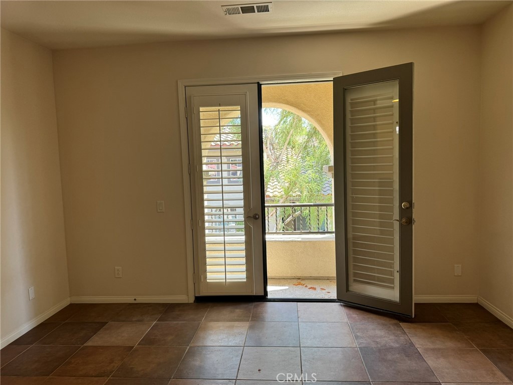 62 Shadowplay Irvine, CA 92620 - Photo 40 of 44 a view of an empty room with a window