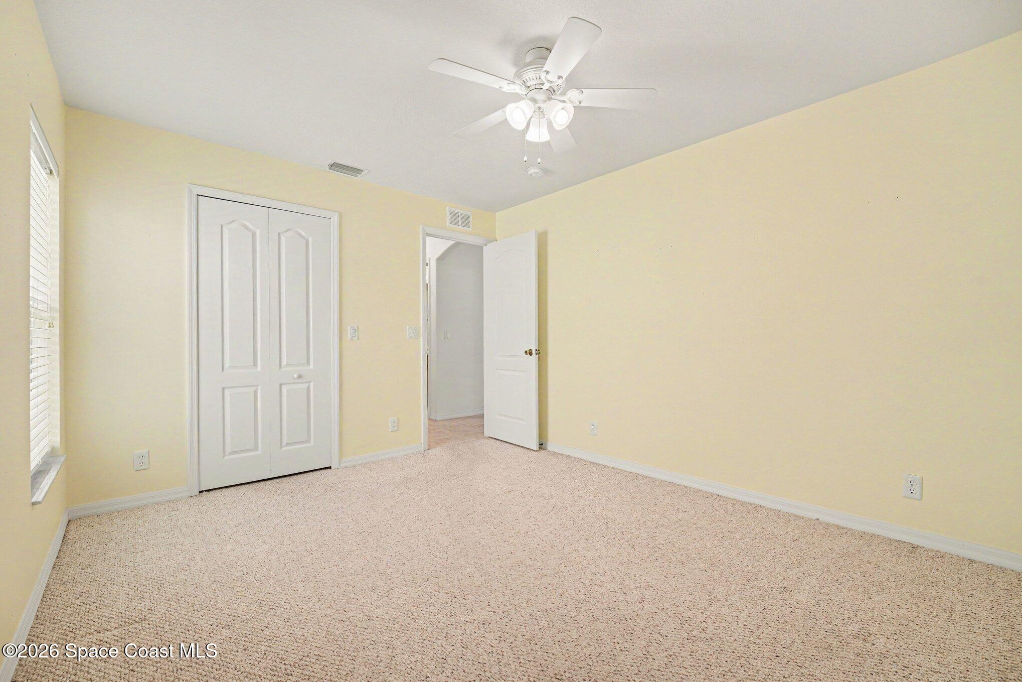 2194 Spring Creek Circle Palm Bay, FL 32905 - Photo 17 of 40 Front Guest Bedroom