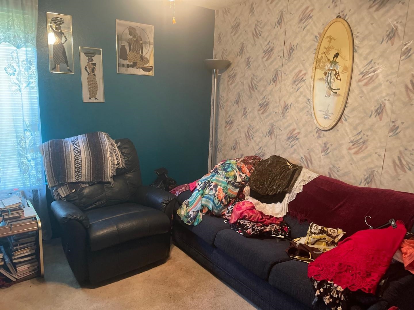 7665 Stone Manor Road Memphis, TN 38125 - Photo 3 of 9 a living room with furniture