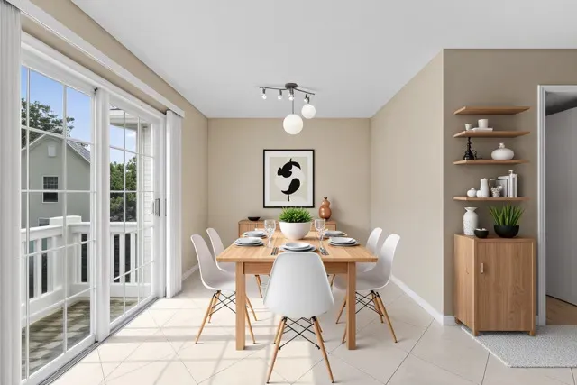 a view of a dining room with furniture wooden floor and chandelier
