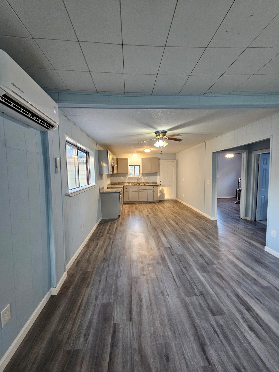 7808 Bauman Road Houston, TX 77022 - Photo 4 of 11 a view of empty room with wooden floor