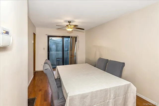 a bedroom with a bed and dresser