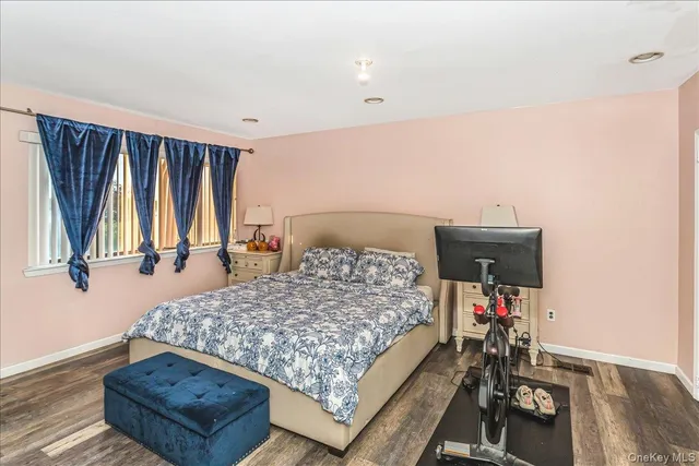 a bed room with a bed and a couch