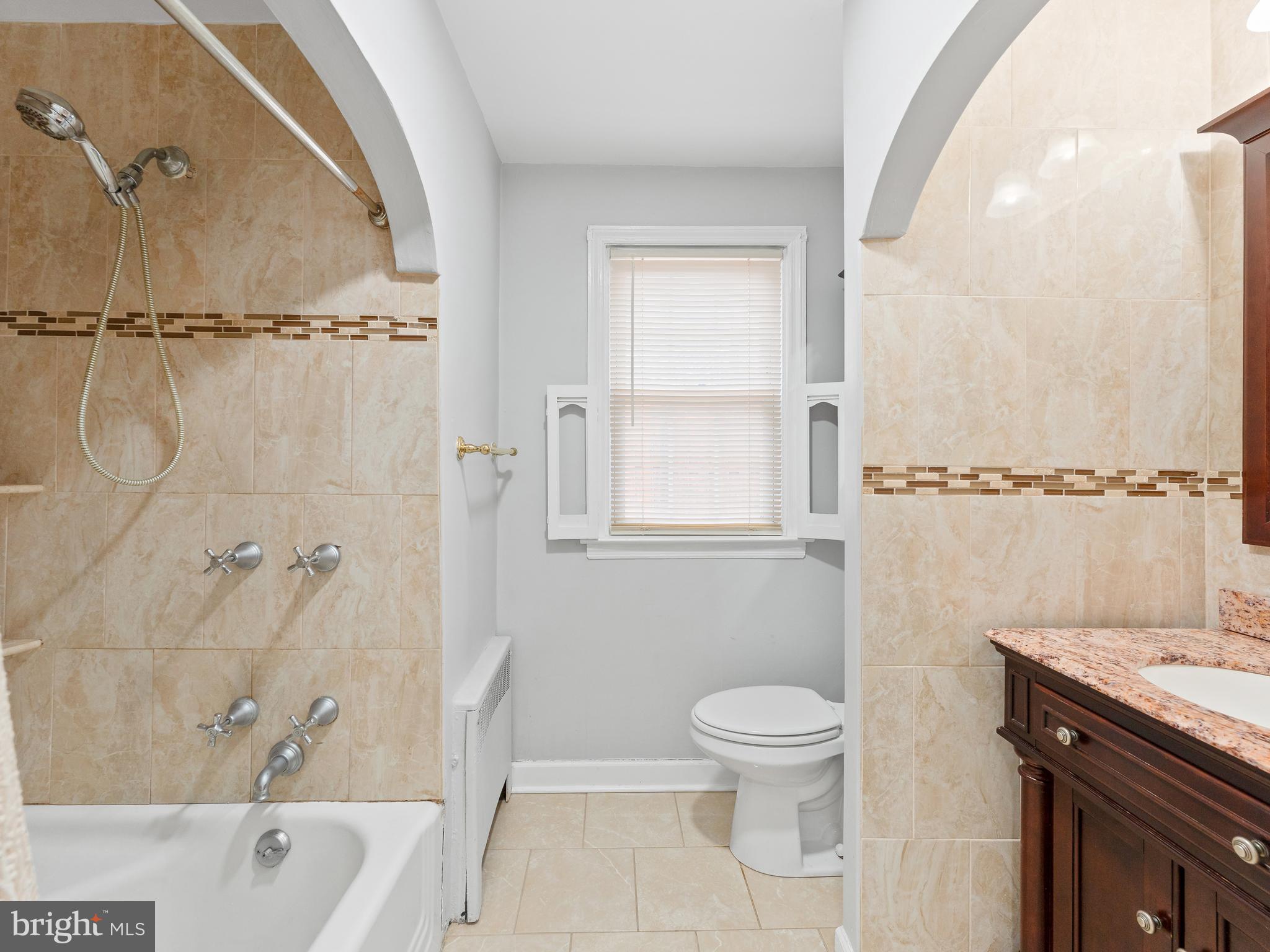 236 Boyer Road Cheltenham, PA 19012 - Photo 12 of 34 a bathroom with a granite countertop sink toilet and shower