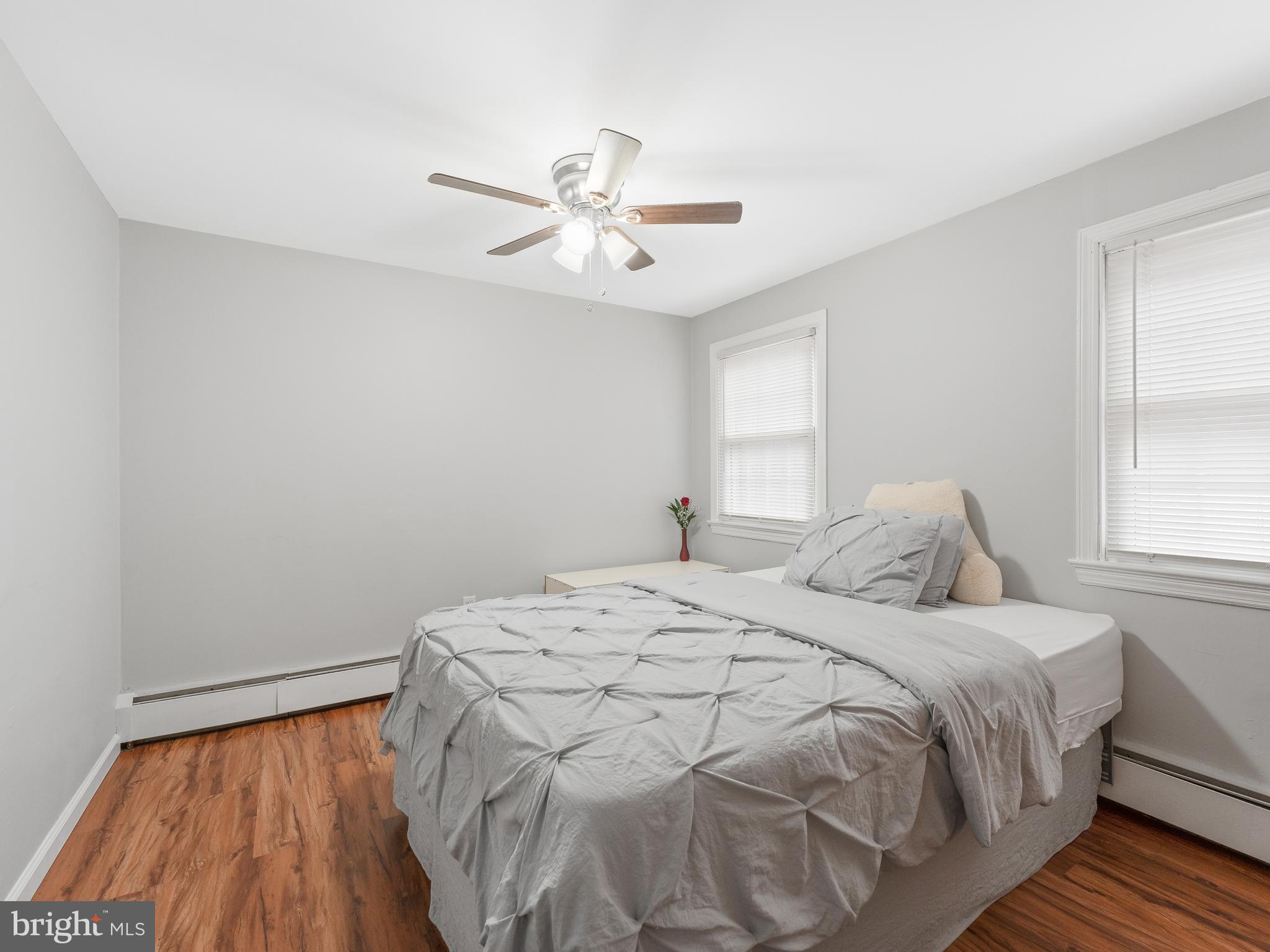 236 Boyer Road Cheltenham, PA 19012 - Photo 16 of 34 a bedroom with a bed and a window