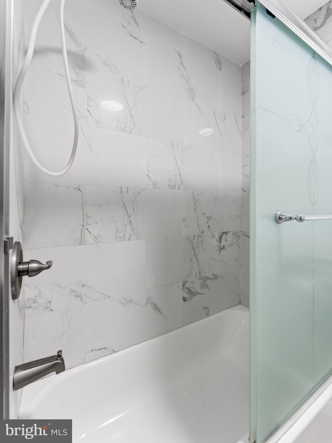 236 Boyer Road Cheltenham, PA 19012 - Photo 20 of 34 a bathroom with a bathtub and a shower