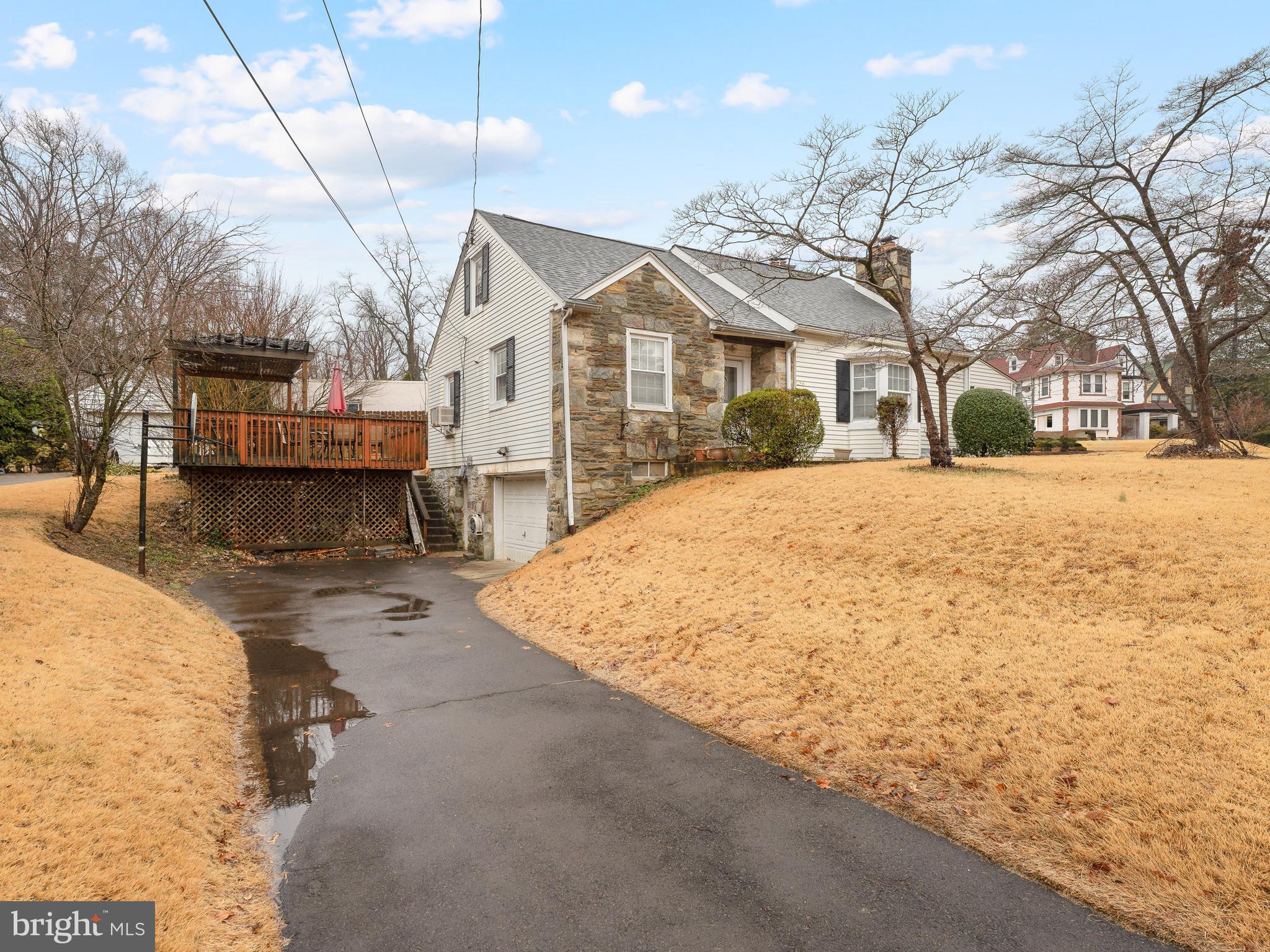 236 Boyer Road Cheltenham, PA 19012 - Photo 2 of 34 a view of a white house with a yard