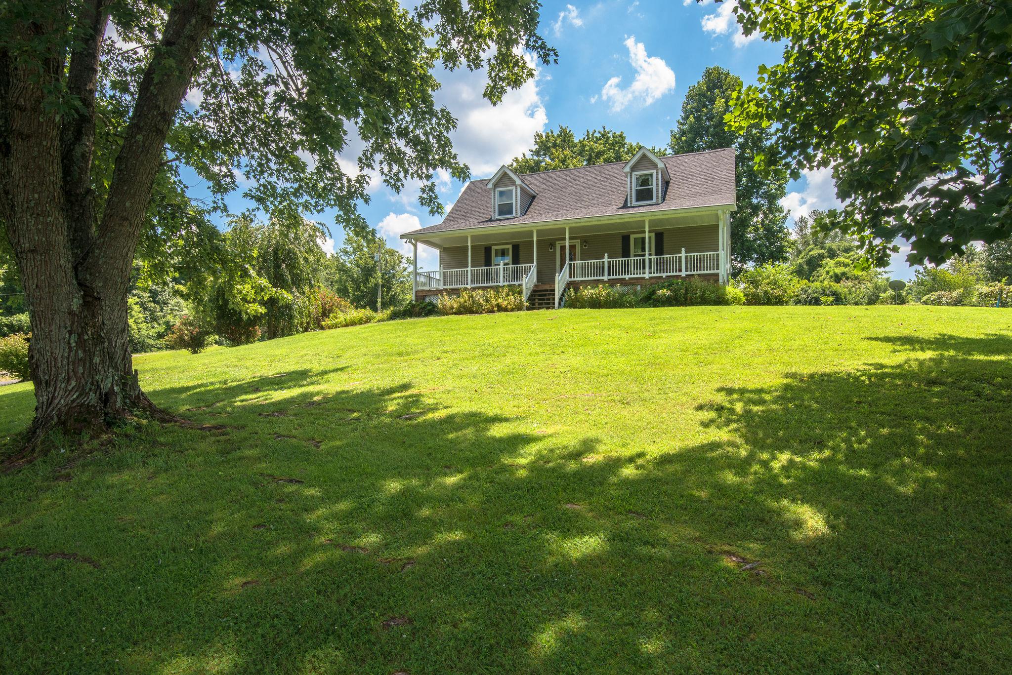7357 Swift Road Greenbrier, TN 37073 - Photo 5 of 30 a front view of a house with a yard