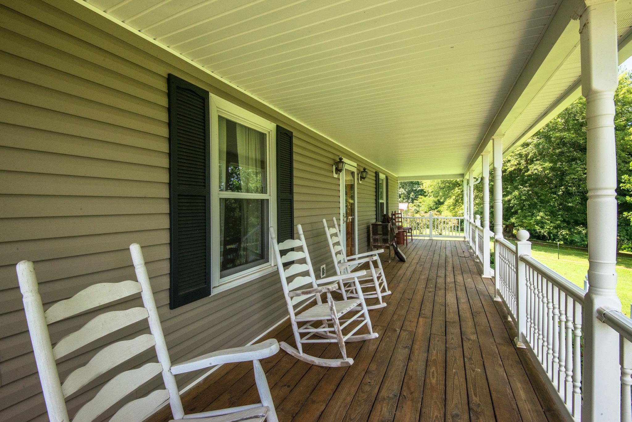 7357 Swift Road Greenbrier, TN 37073 - Photo 6 of 30 a view of a chairs on the roof deck