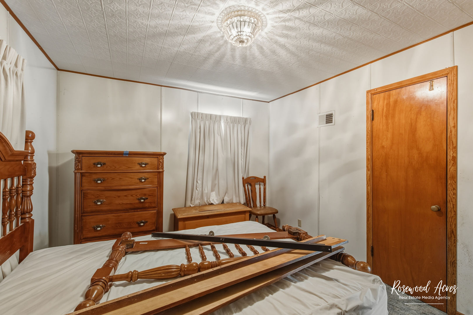 1221 East Chestnut Street Kankakee, IL 60901 - Photo 14 of 22 a bedroom with a bed and a dresser