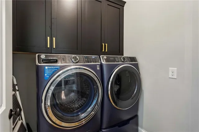 a view of a storage & utility room with a sink