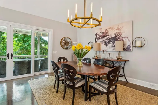 a bedroom with double bed and a dresser