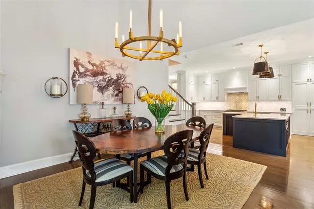 a bedroom with a bed and flat screen tv