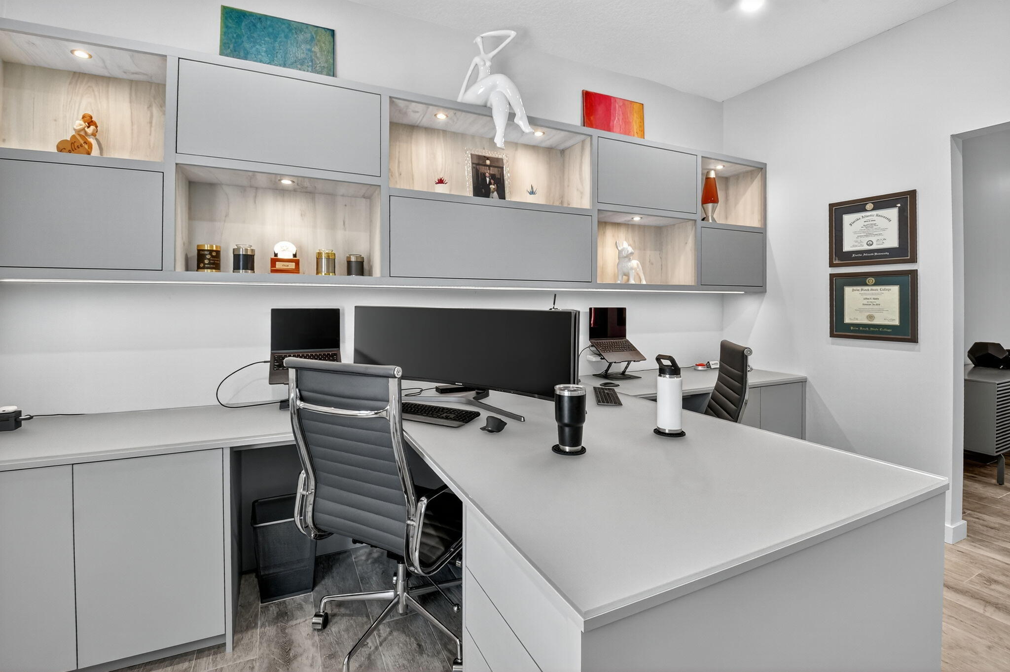 494 Enfield Court Delray Beach, FL 33444 - Photo 28 of 78 a kitchen with a table chairs a stove and cabinets