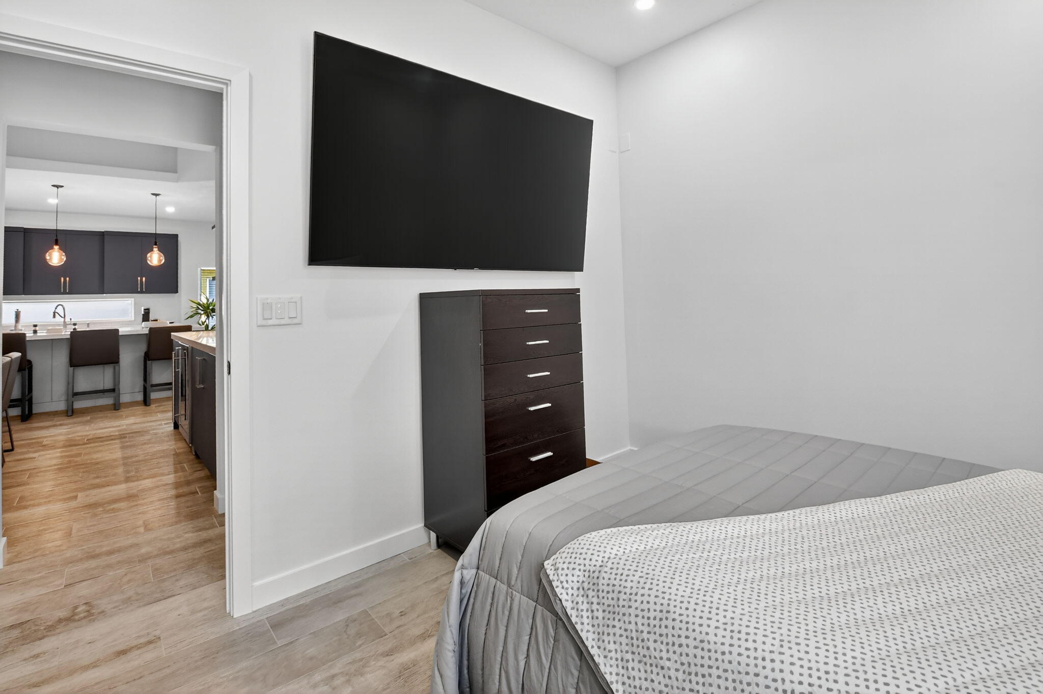 494 Enfield Court Delray Beach, FL 33444 - Photo 30 of 78 a bedroom with a bed and a flat screen tv