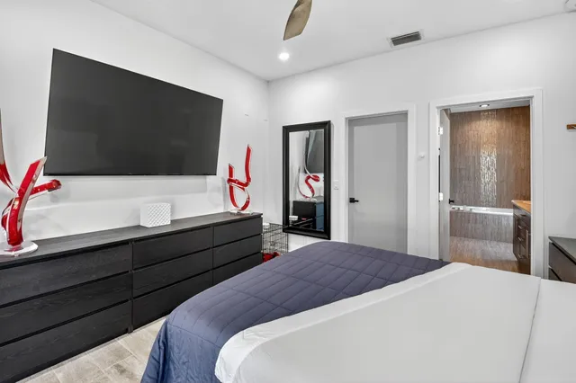 a view of a swimming pool with a patio and a garden