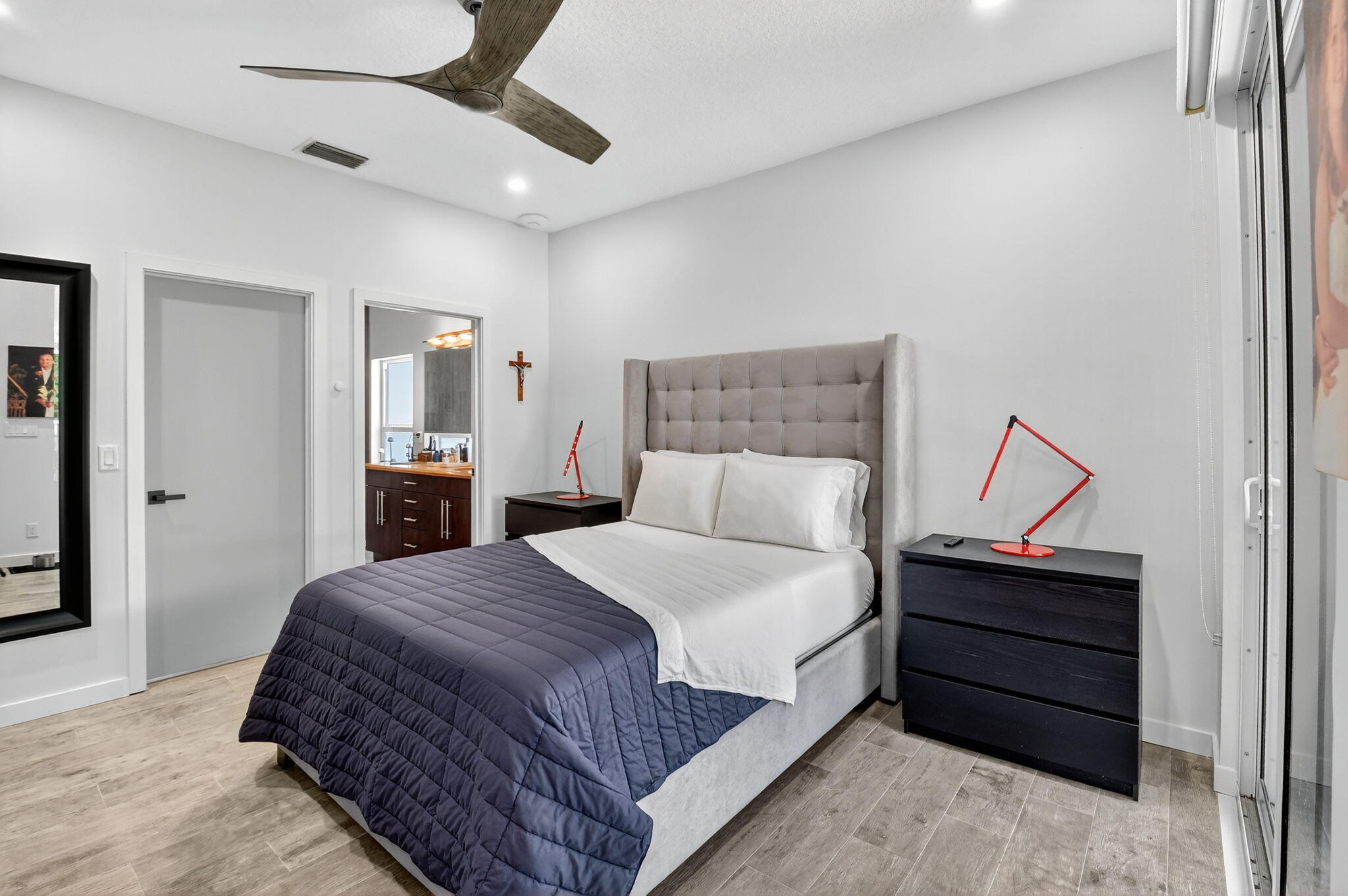 494 Enfield Court Delray Beach, FL 33444 - Photo 34 of 78 a bedroom with a bed and a ceiling fan