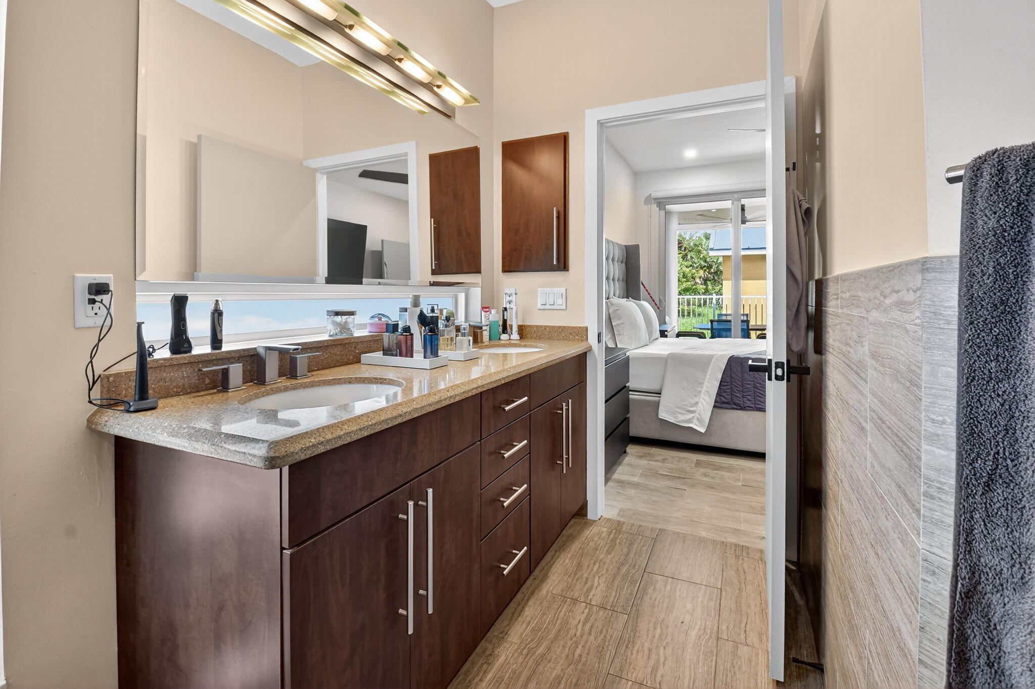 494 Enfield Court Delray Beach, FL 33444 - Photo 36 of 78 a bathroom with a sink double vanity and a mirror