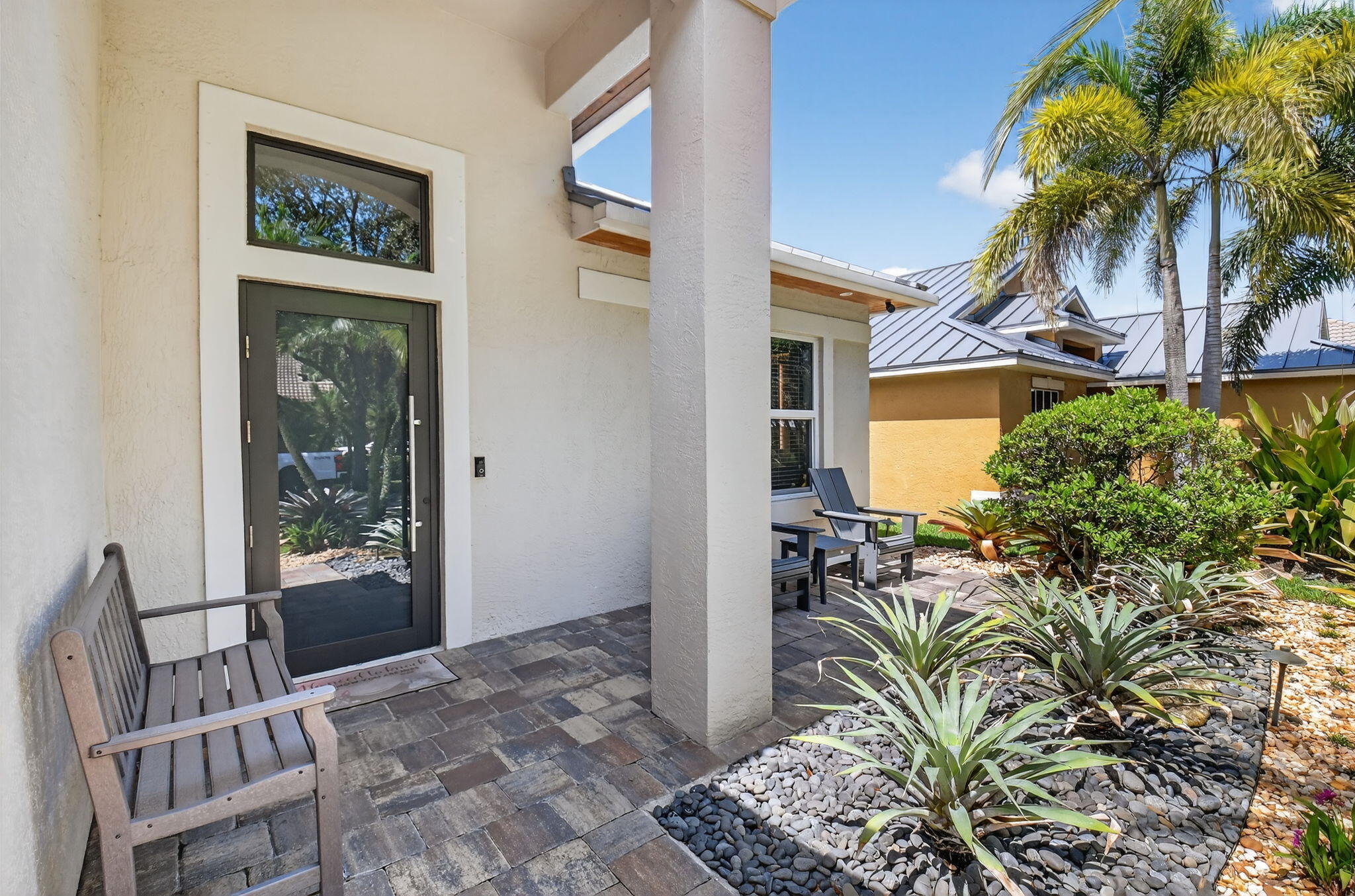 494 Enfield Court Delray Beach, FL 33444 - Photo 4 of 78 a view of entryway and hall with wooden floor