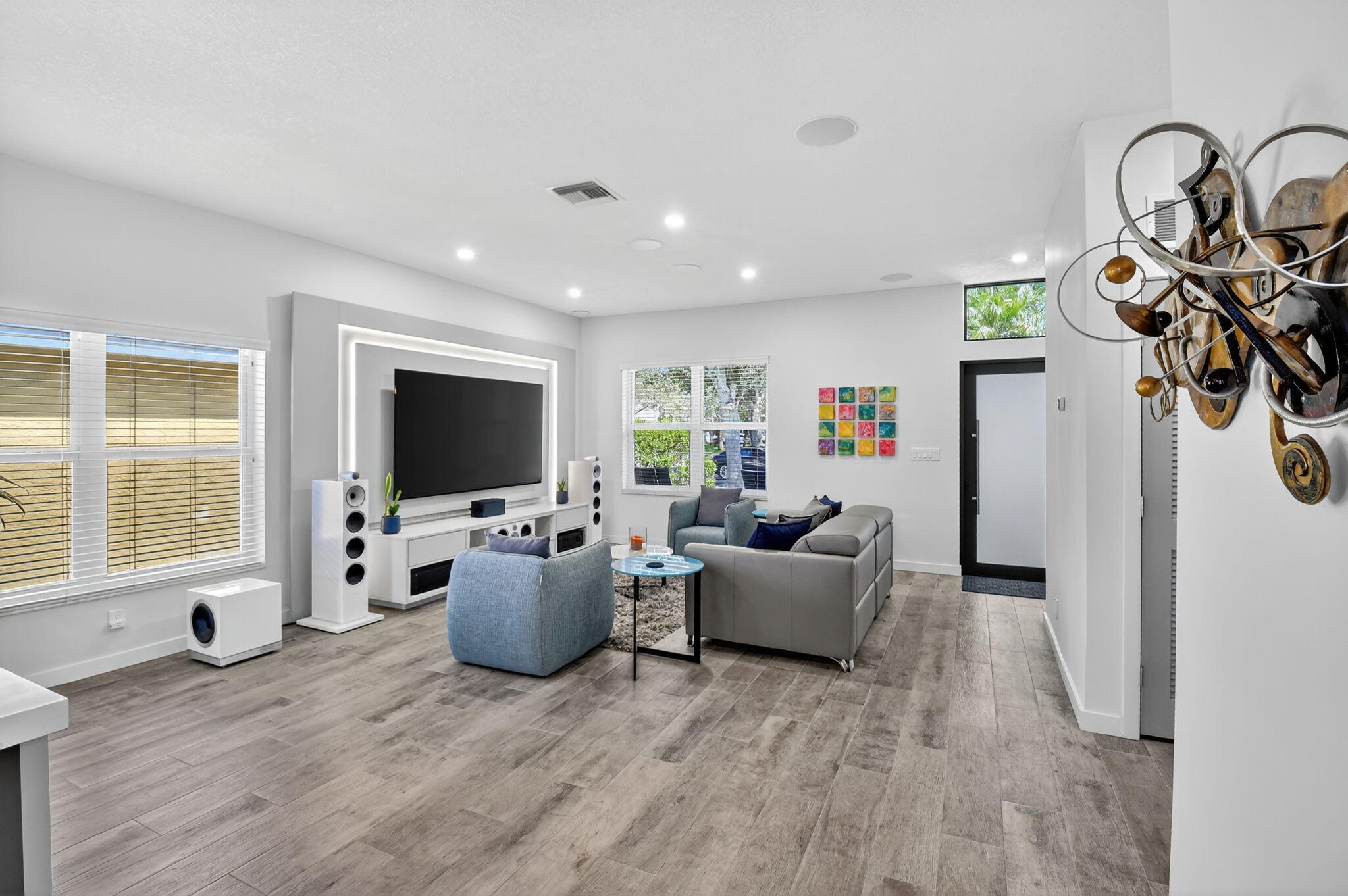 494 Enfield Court Delray Beach, FL 33444 - Photo 6 of 78 a living room with furniture and a flat screen tv