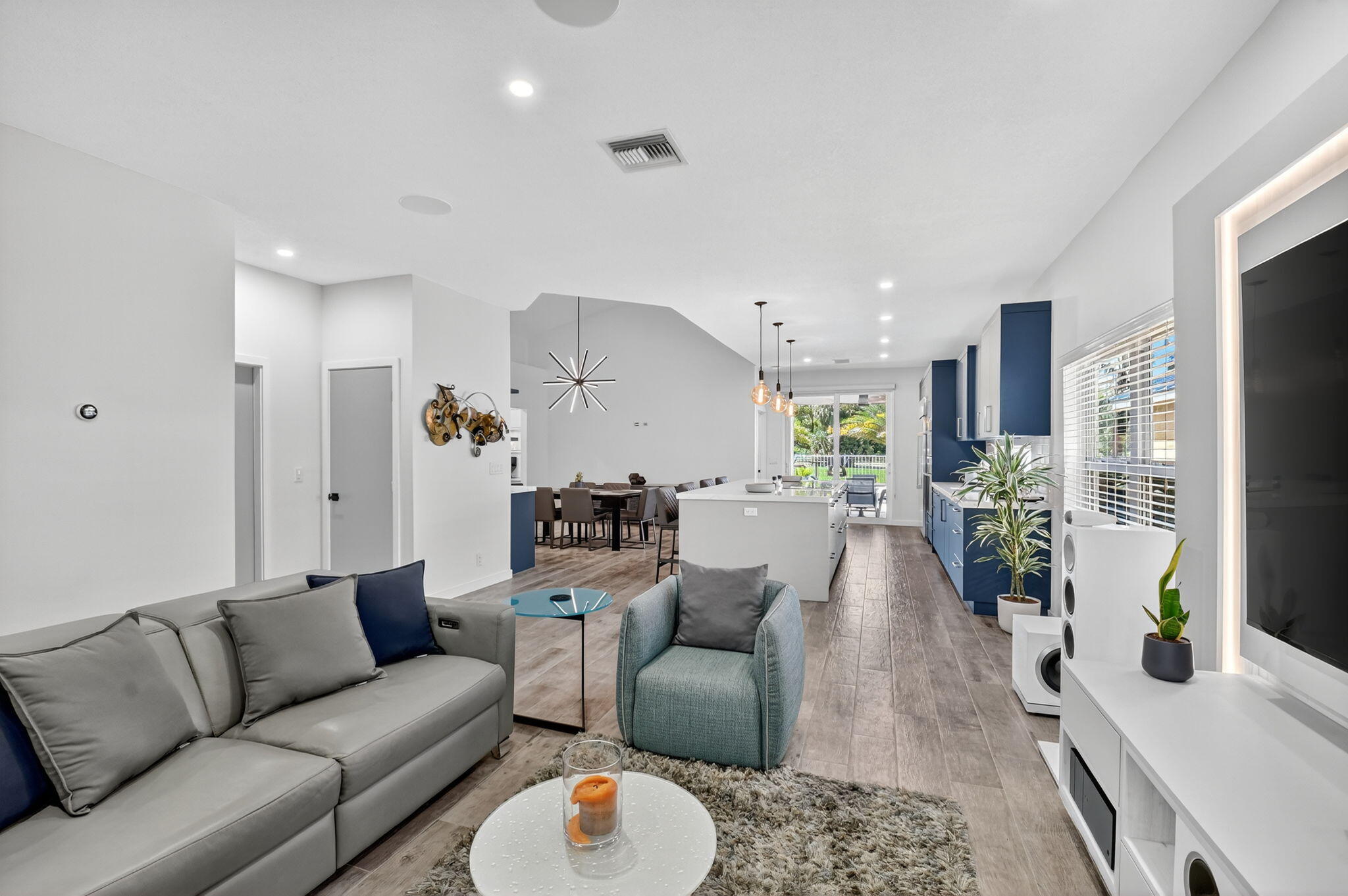 494 Enfield Court Delray Beach, FL 33444 - Photo 7 of 78 a living room with furniture white walls and a dining table with kitchen view