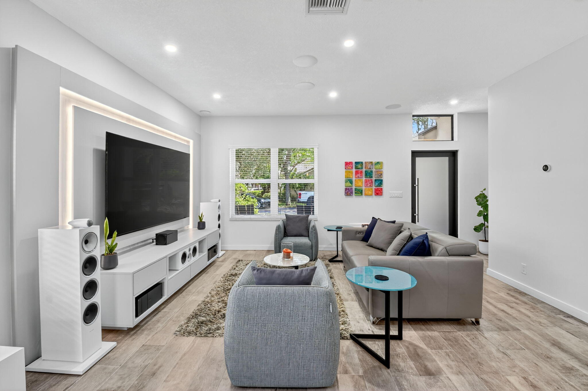 494 Enfield Court Delray Beach, FL 33444 - Photo 9 of 78 a living room with furniture and a flat screen tv