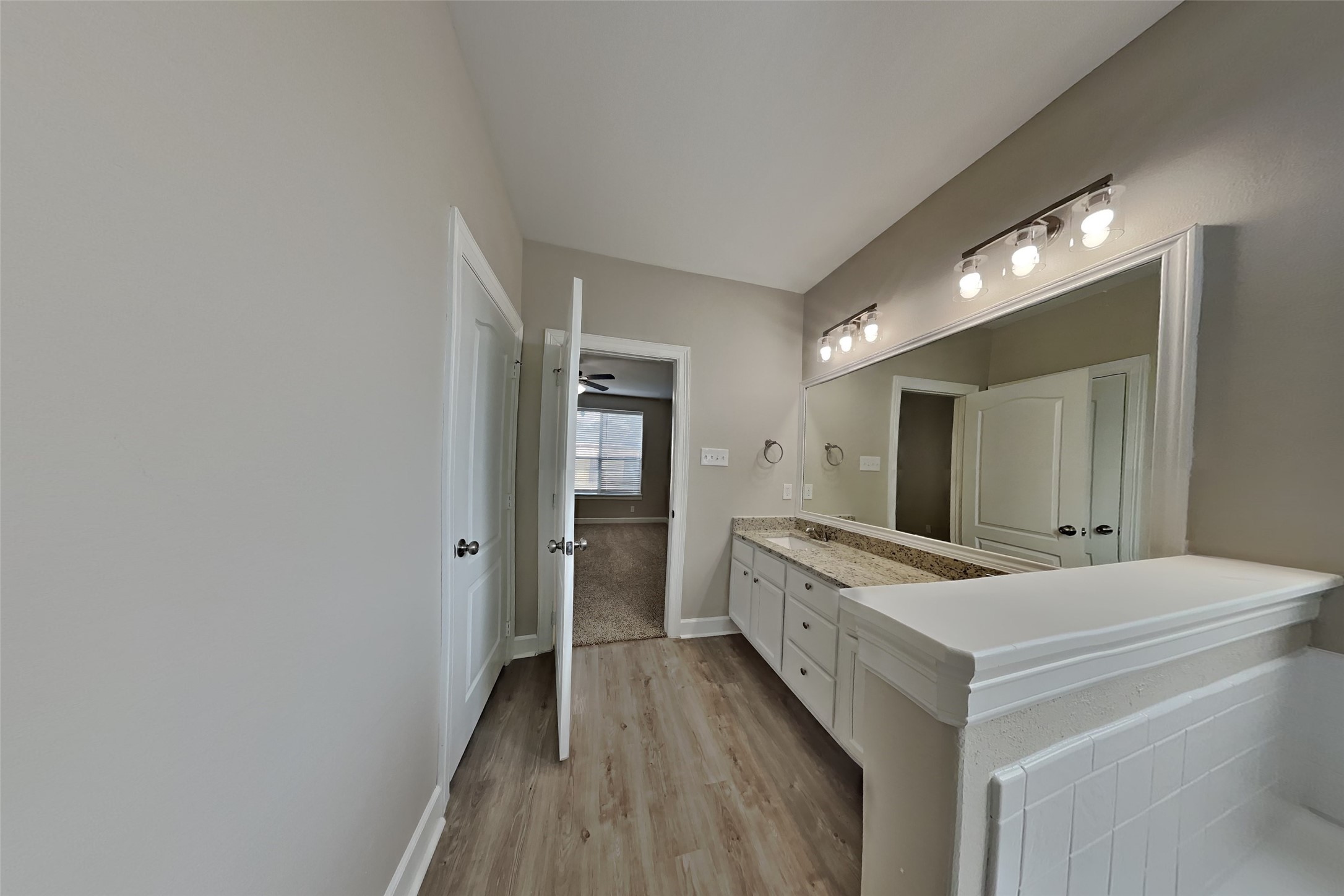 4718 Wild Bluebonnet Way Houston, TX 77084 - Photo 8 of 20 a view of bathroom with dual sinks
