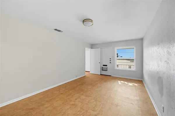 a view of a livingroom with a window