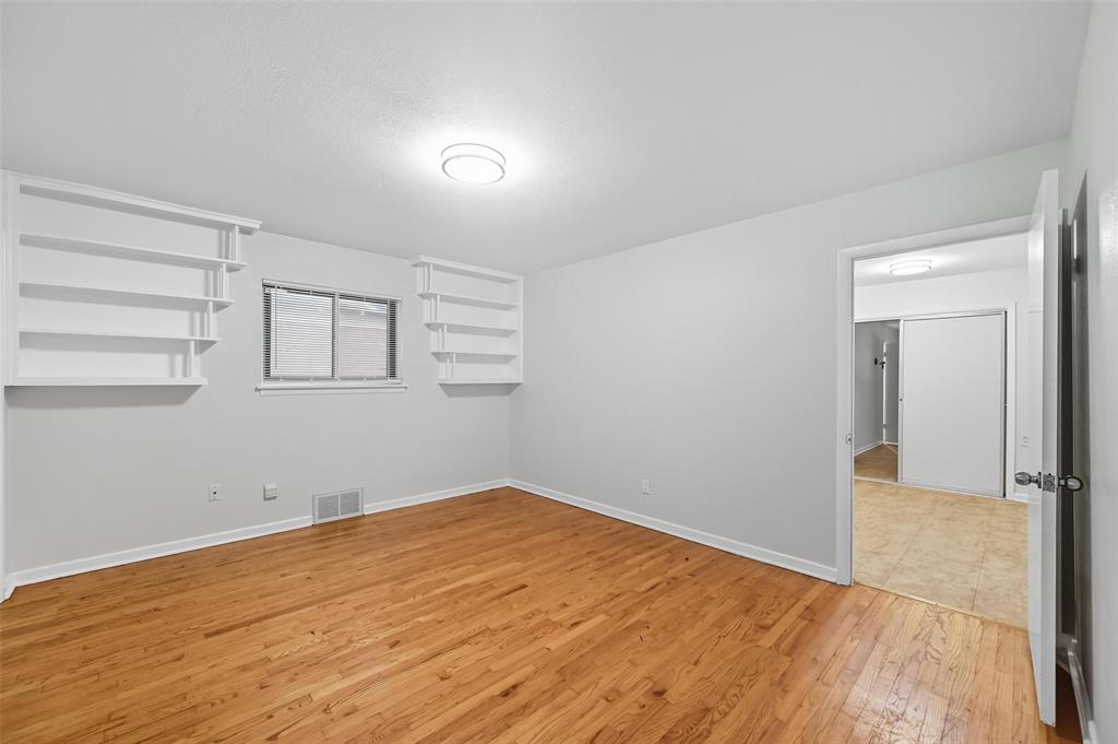 3512 Park Ridge Boulevard Fort Worth, TX 76109 - Photo 6 of 16 a view of empty room with wooden floor