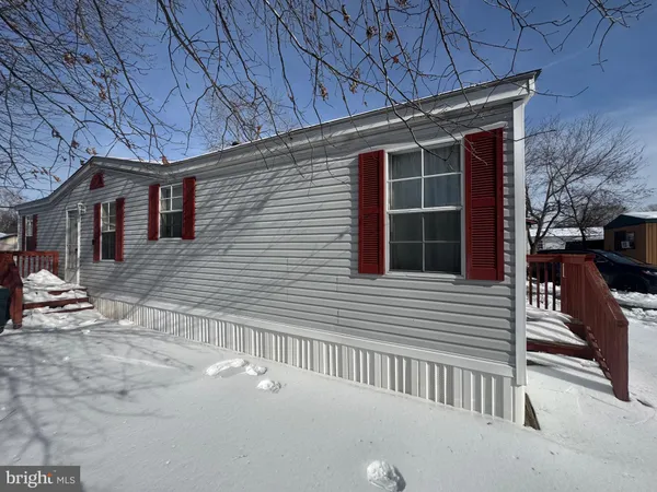 a view of a house with a garage