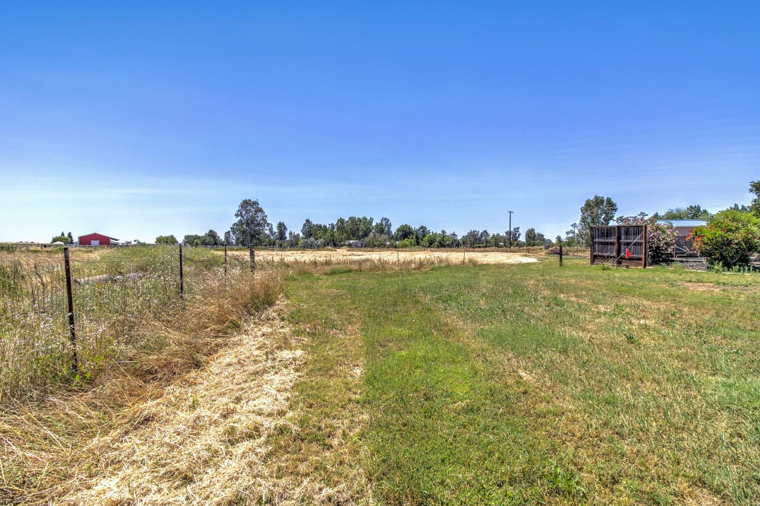 12390 Hobday Road Wilton, CA 95693 - Photo 68 of 92 a view of a lake with a city