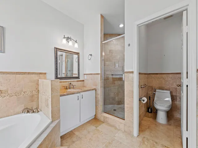 a view of a hallway with a window