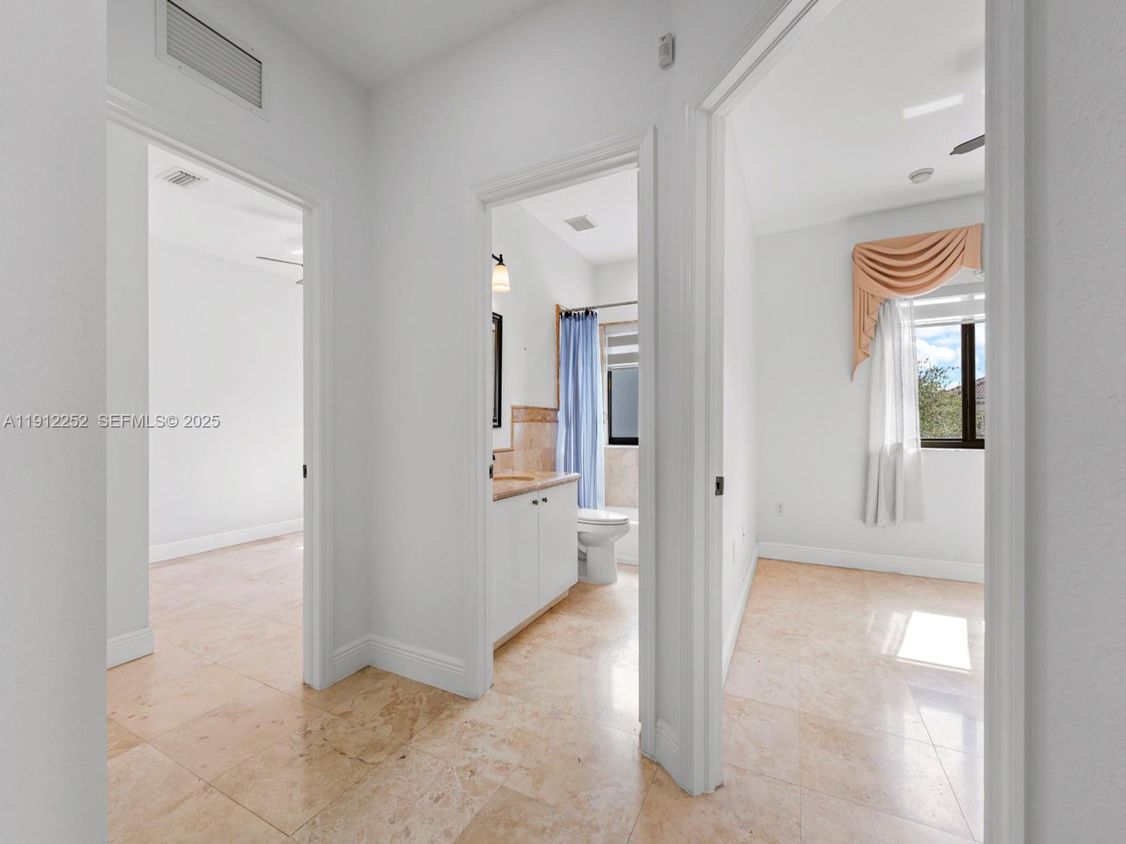 15871 Southwest 141st Street Miami, FL 33196 - Photo 29 of 41 a view of a bathroom with closet area