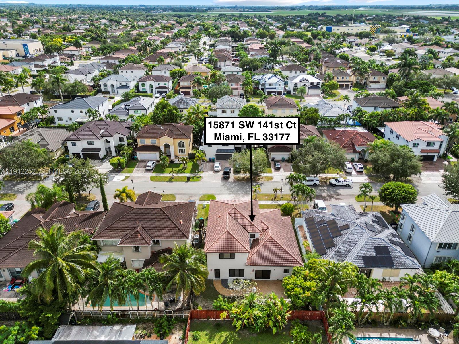 15871 Southwest 141st Street Miami, FL 33196 - Photo 39 of 41 an aerial view of residential houses with outdoor space