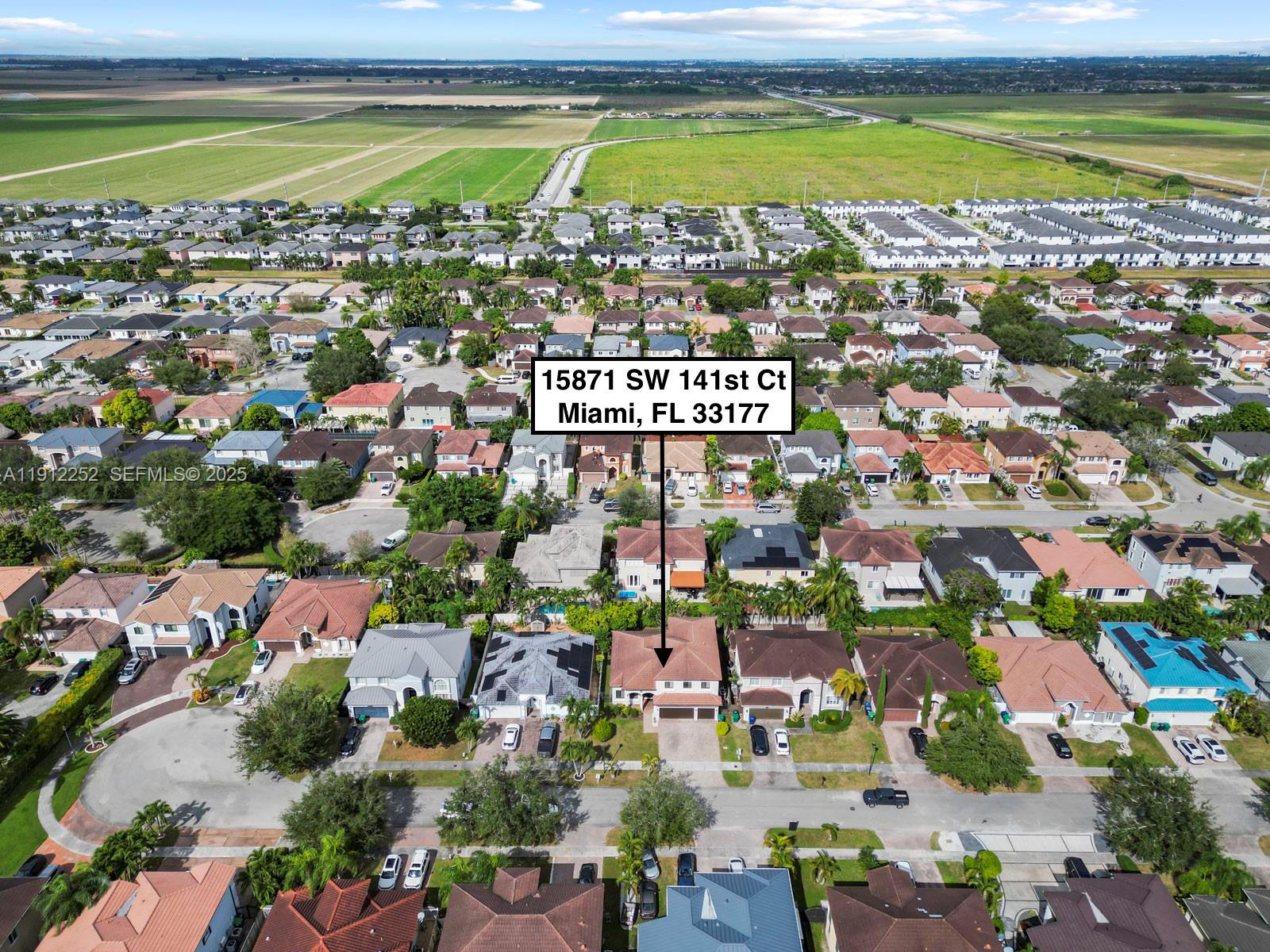 15871 Southwest 141st Street Miami, FL 33196 - Photo 40 of 41 a view of a city with ocean