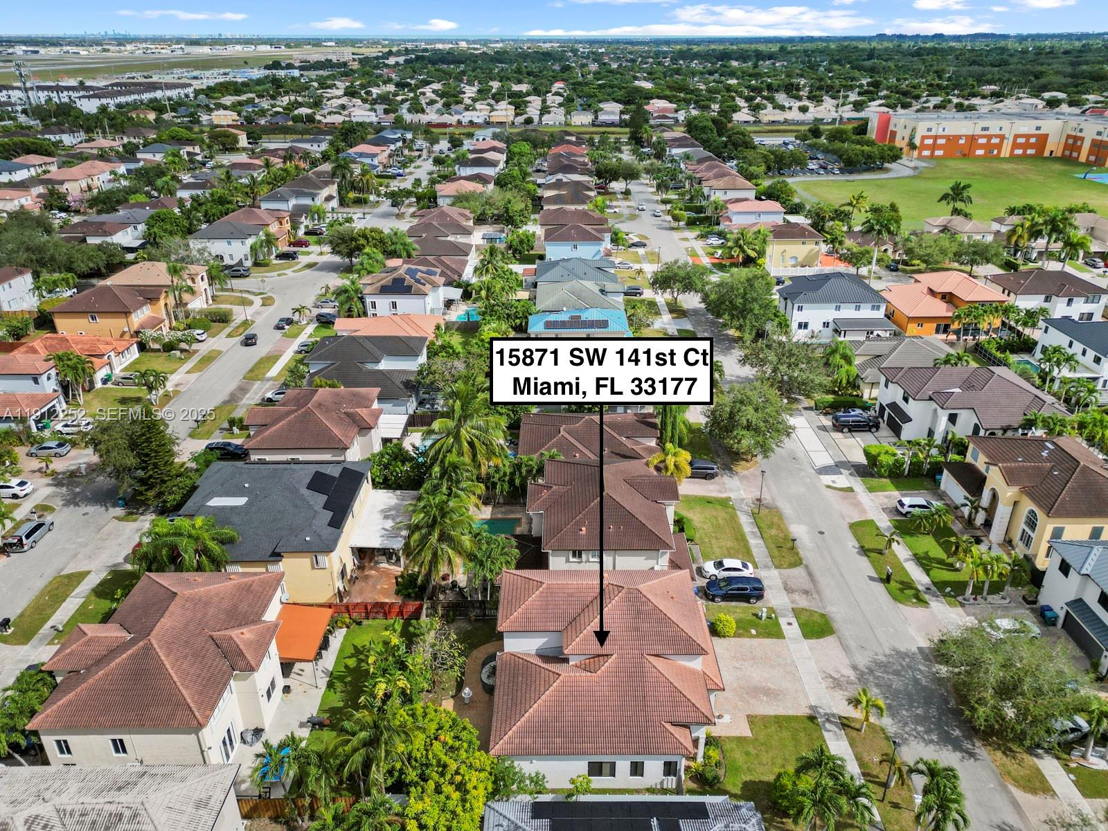 15871 Southwest 141st Street Miami, FL 33196 - Photo 41 of 41 an aerial view of residential houses with outdoor space and street view