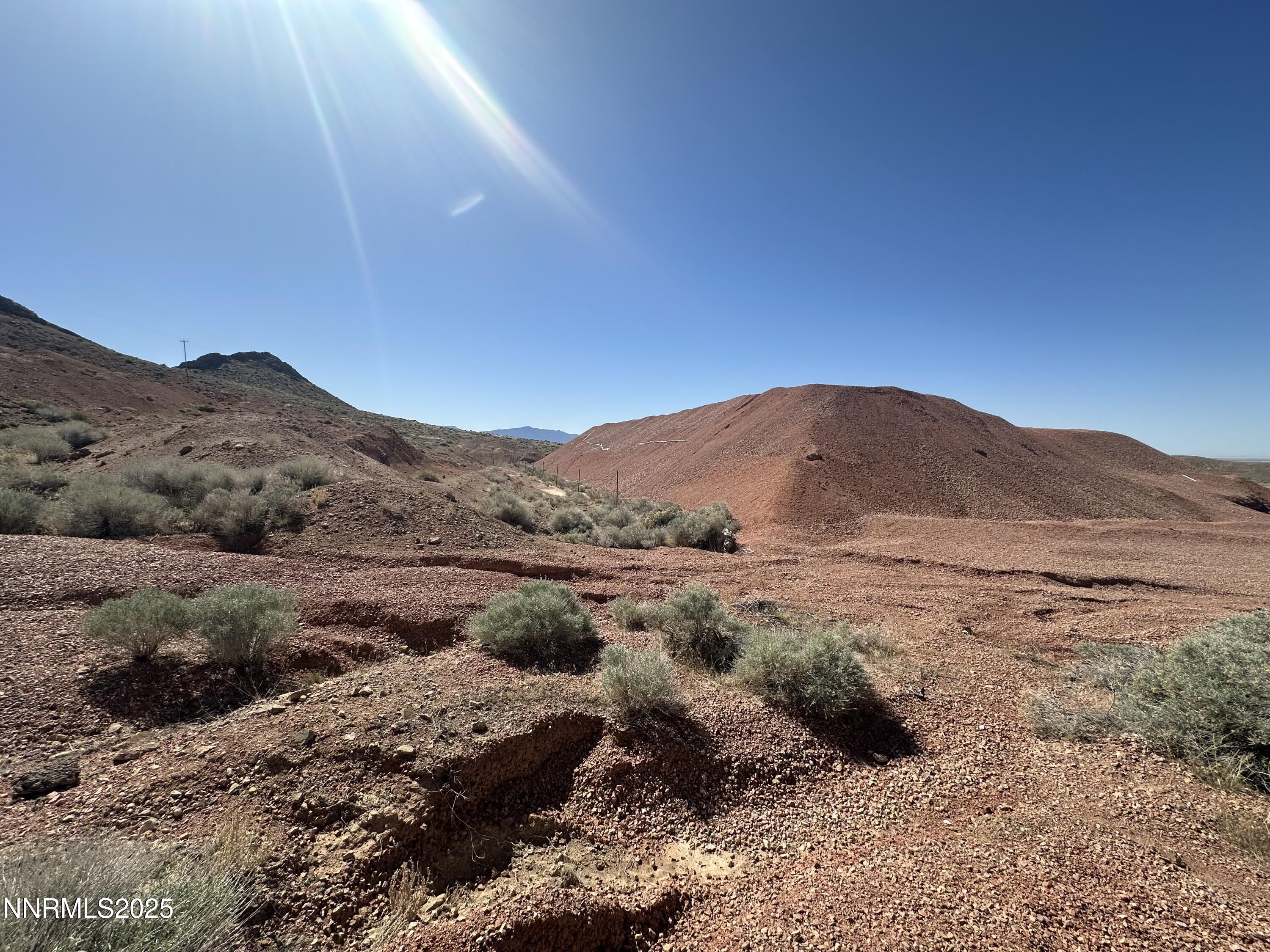 1508012 Coal Canyon Road Lovelock, NV 89419 - Photo 12 of 40 a view of a mountain range with trees