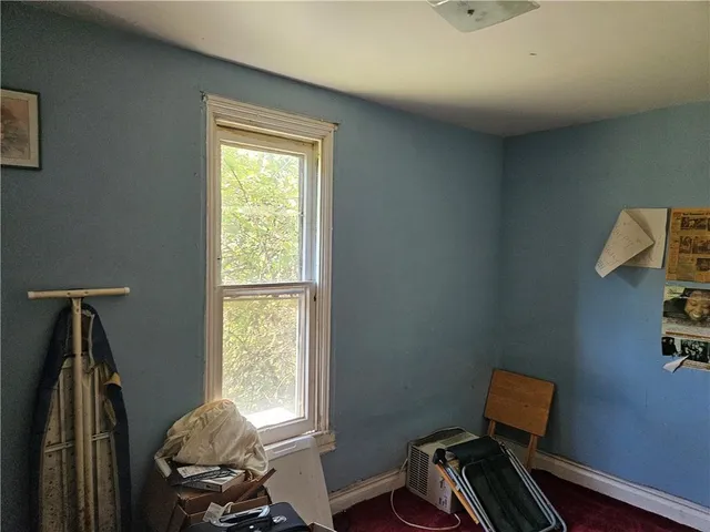 a kitchen with granite countertop a stove and a refrigerator