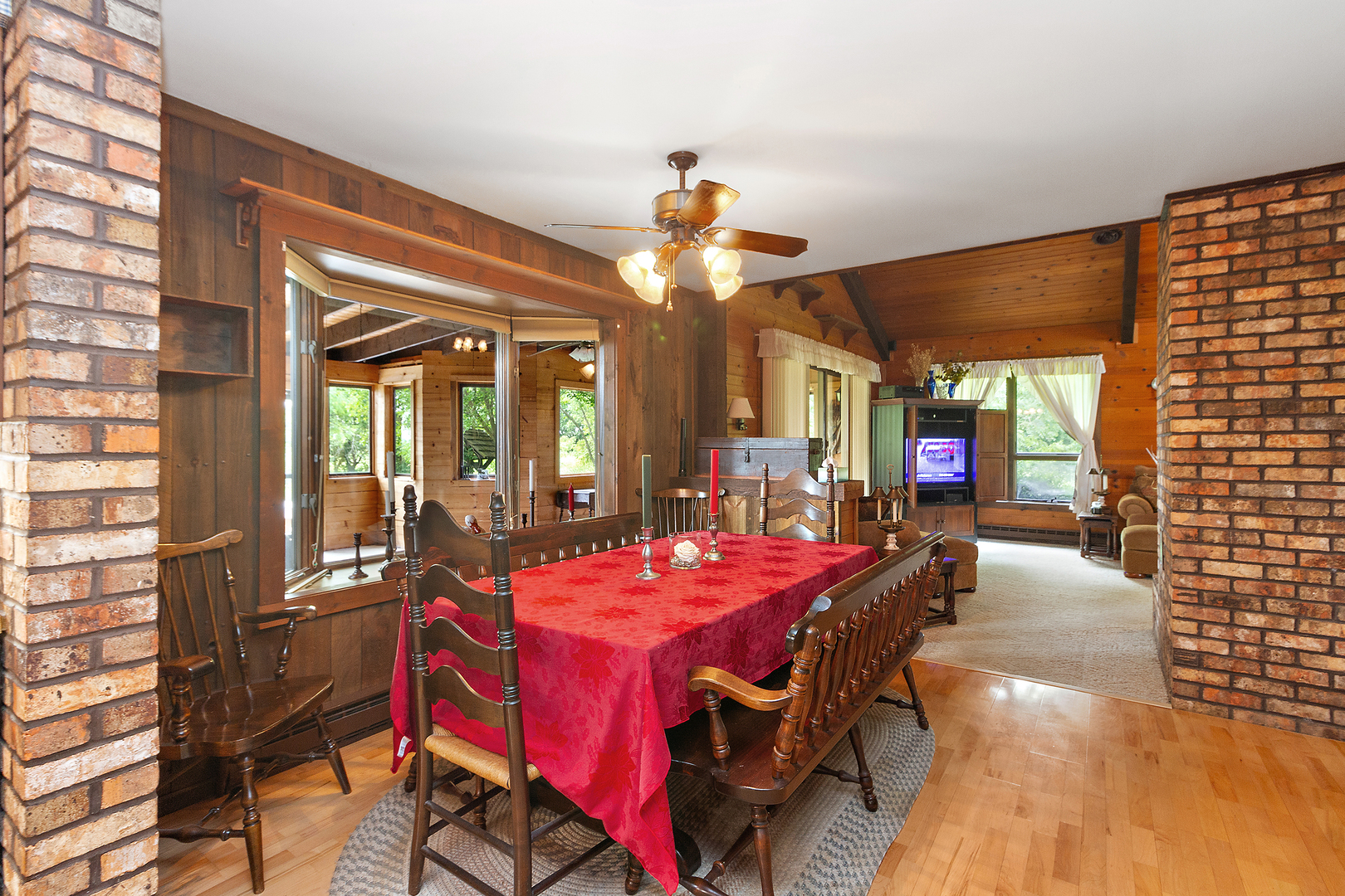 32444 Wilton Road Manhattan, IL 60442 - Photo 14 of 28 a view of a dining room with furniture and chandelier