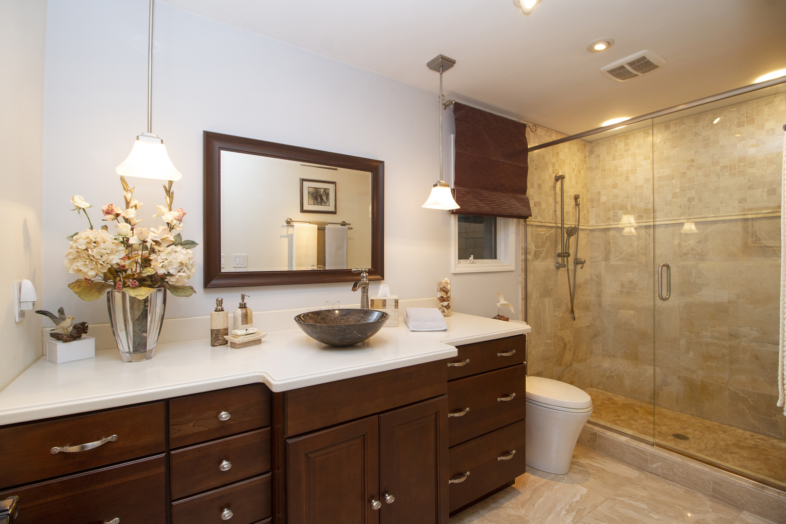32444 Wilton Road Manhattan, IL 60442 - Photo 16 of 28 a bathroom with double vanity sinks a toilet a mirror and shower