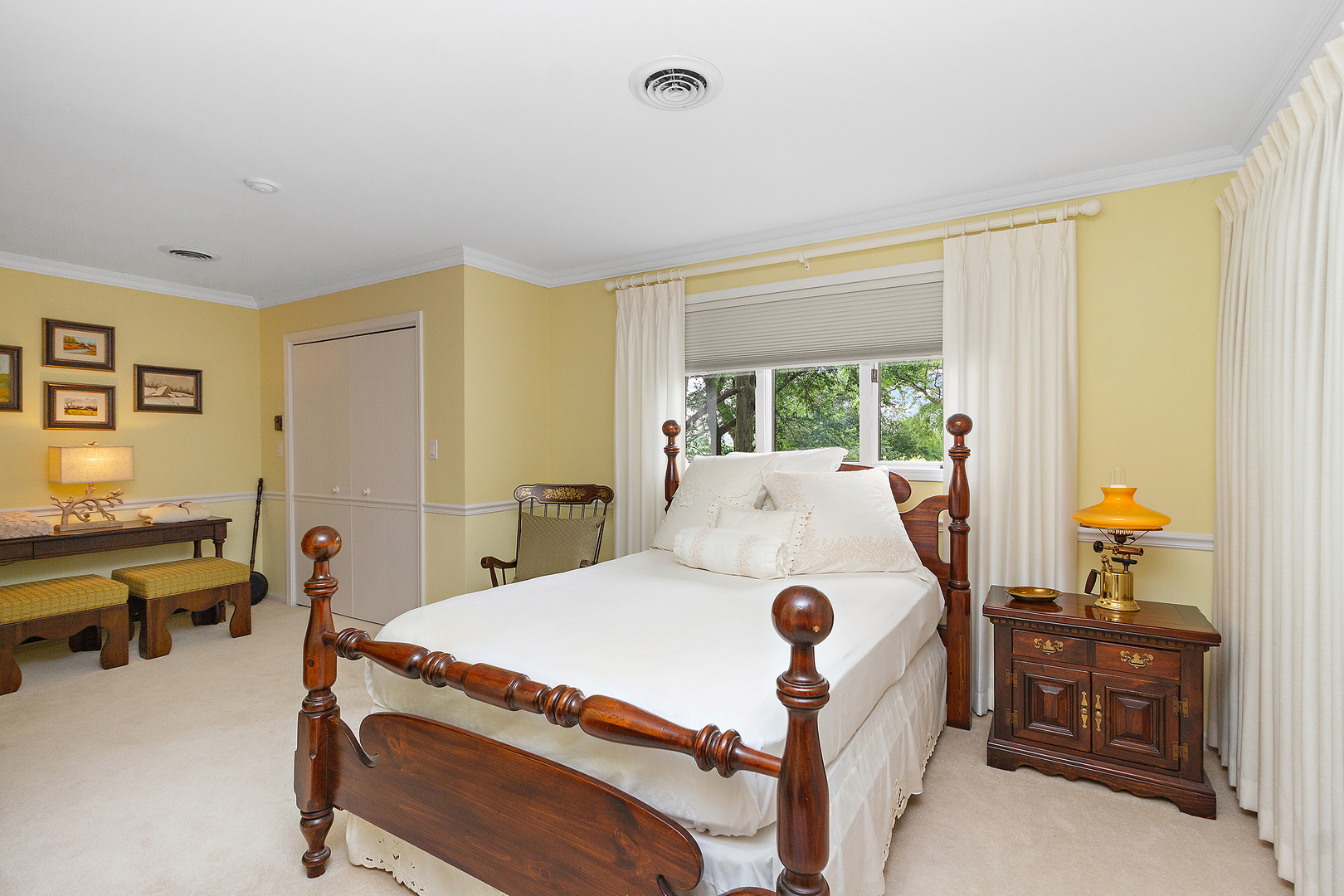 32444 Wilton Road Manhattan, IL 60442 - Photo 17 of 28 a bed room with a bed and a table