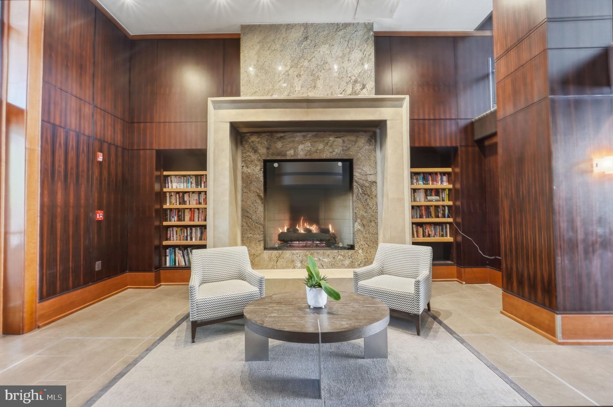 11990 Market Street, Unit 2103 Reston, VA 20190 - Photo 63 of 78 Cozy elegance with a warm fireplace.