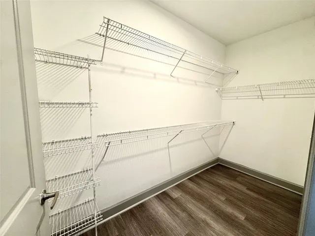 a view of a room with racks on the wall