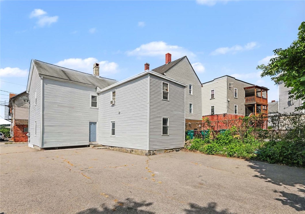 193 Arnold Street Woonsocket, RI 02895 - Photo 17 of 19 Side/Rear and parking area.