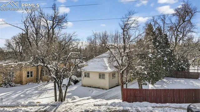 a view of a backyard of snow