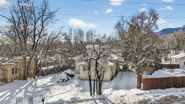 a view of a backyard of the house
