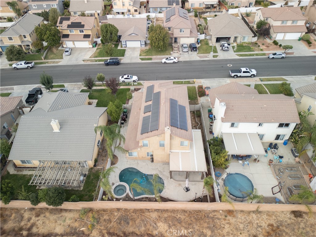 1464 Augusta Street Beaumont, CA 92223 - Photo 3 of 32 an aerial view of residential houses with outdoor space